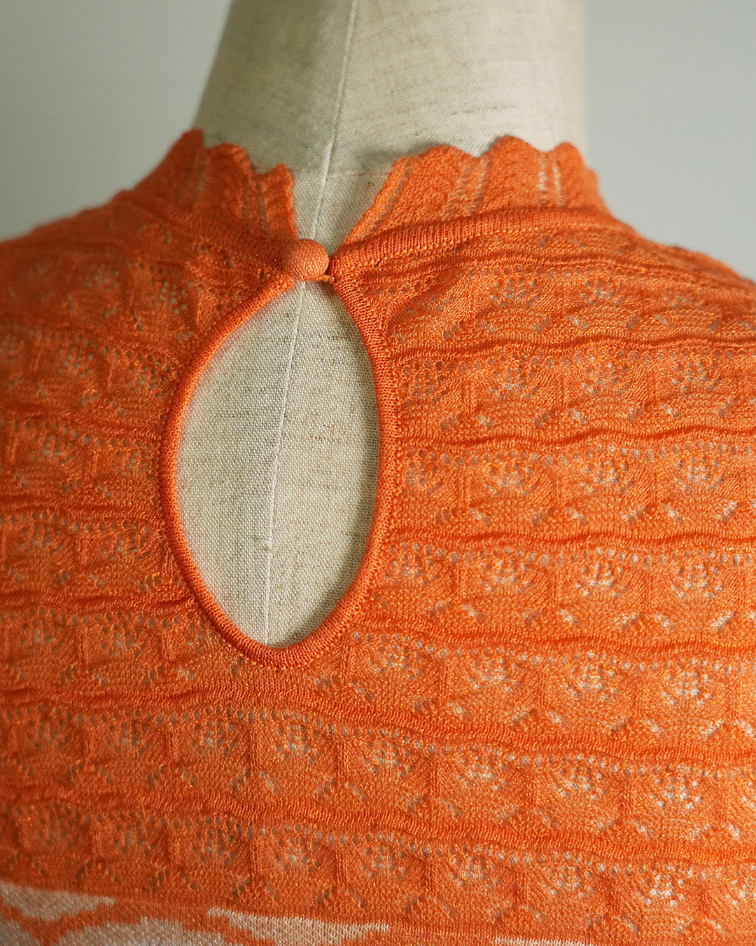 Wave-pattern lamé knitted dress Orange