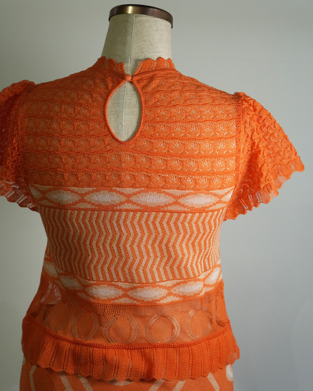 Wave-pattern lamé knitted dress Orange