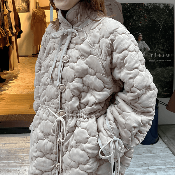 Removable 3D printed button quilted shell jacket Beige