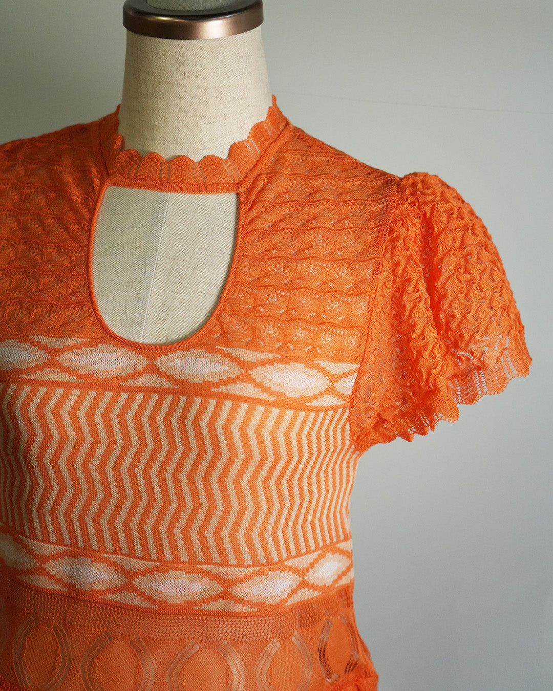 Wave-pattern lamé knitted dress Orange