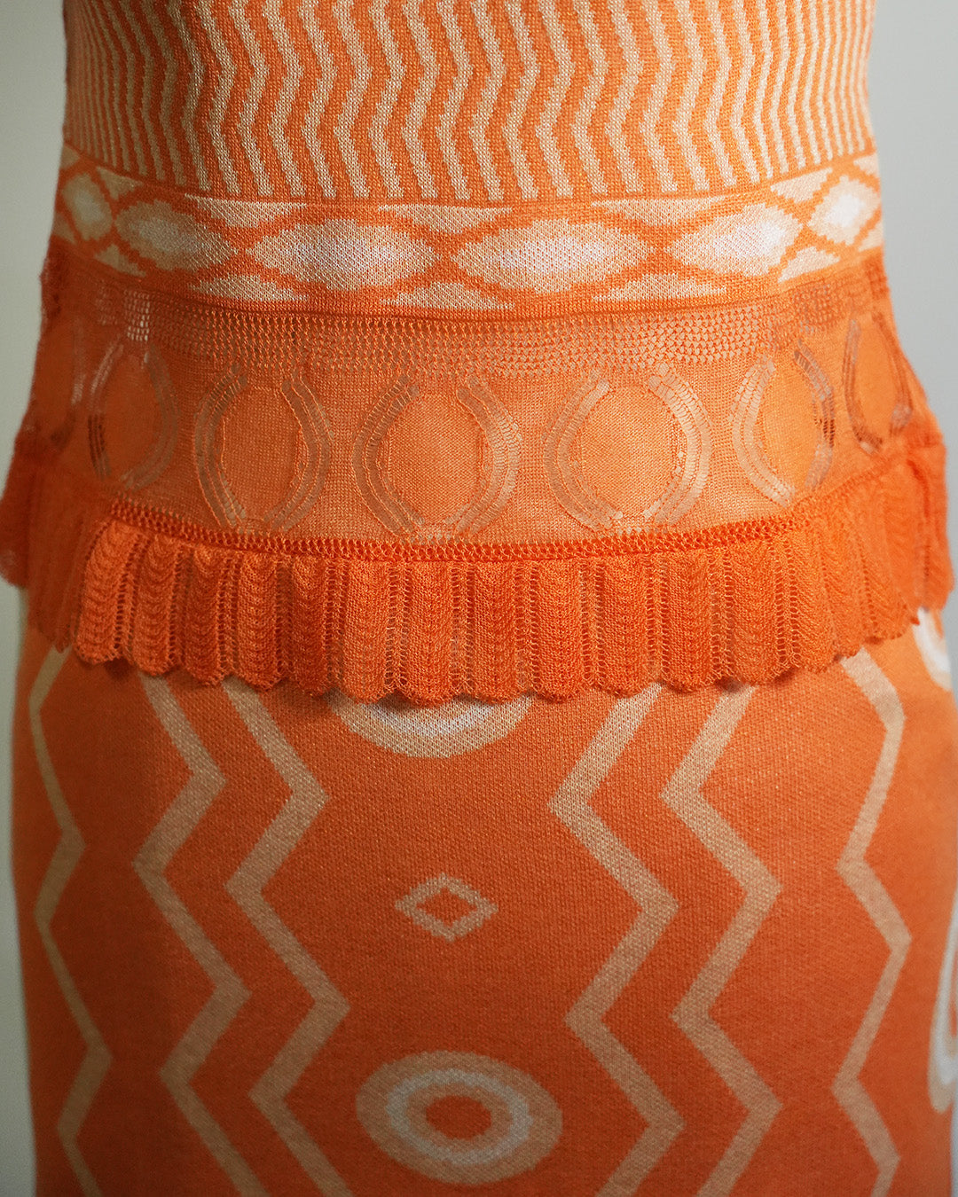 Wave-pattern lamé knitted dress Orange